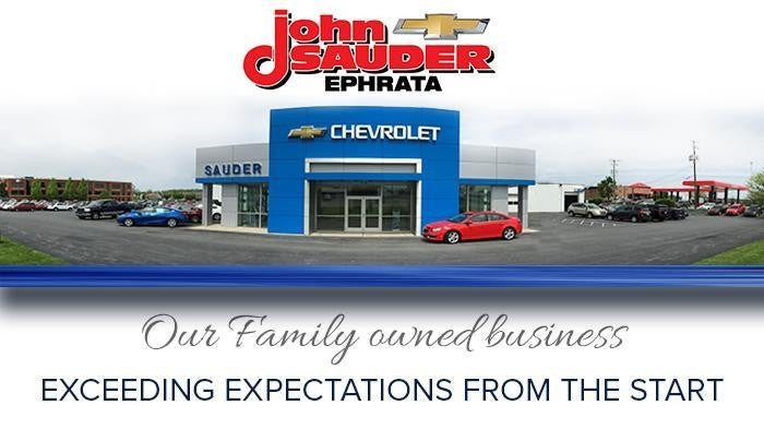 John Sauder Chevrolet dealership in Ephrata featuring a blue and silver Chevrolet showroom building with the Chevrolet logo